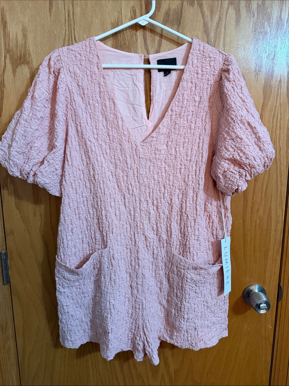 Lumiere Pale Pink Crinkle V-Neck Romper with Pockets